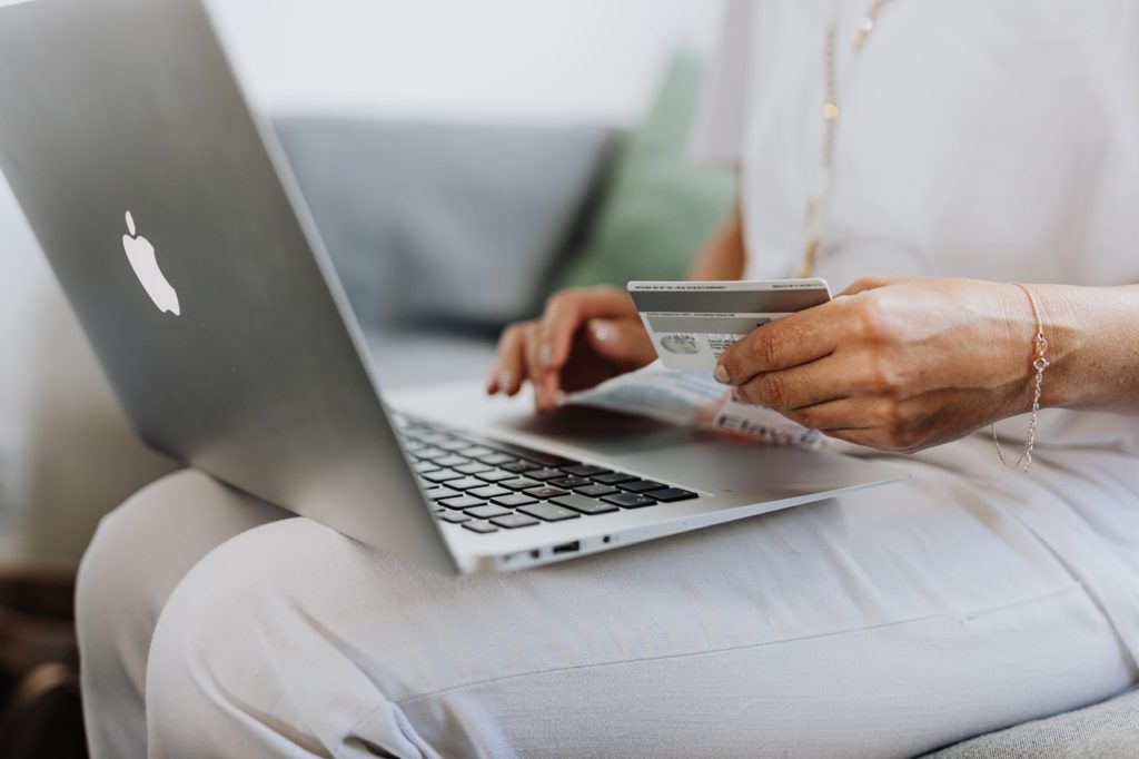photo of person making an online purchase
