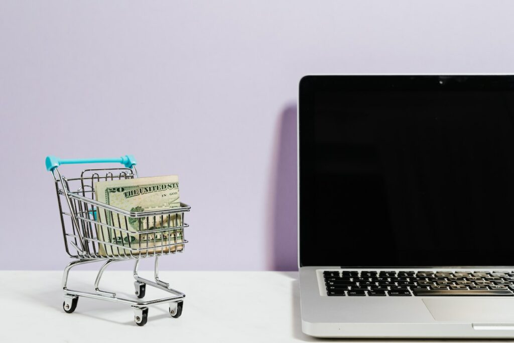 photo of shopping cart and monitor