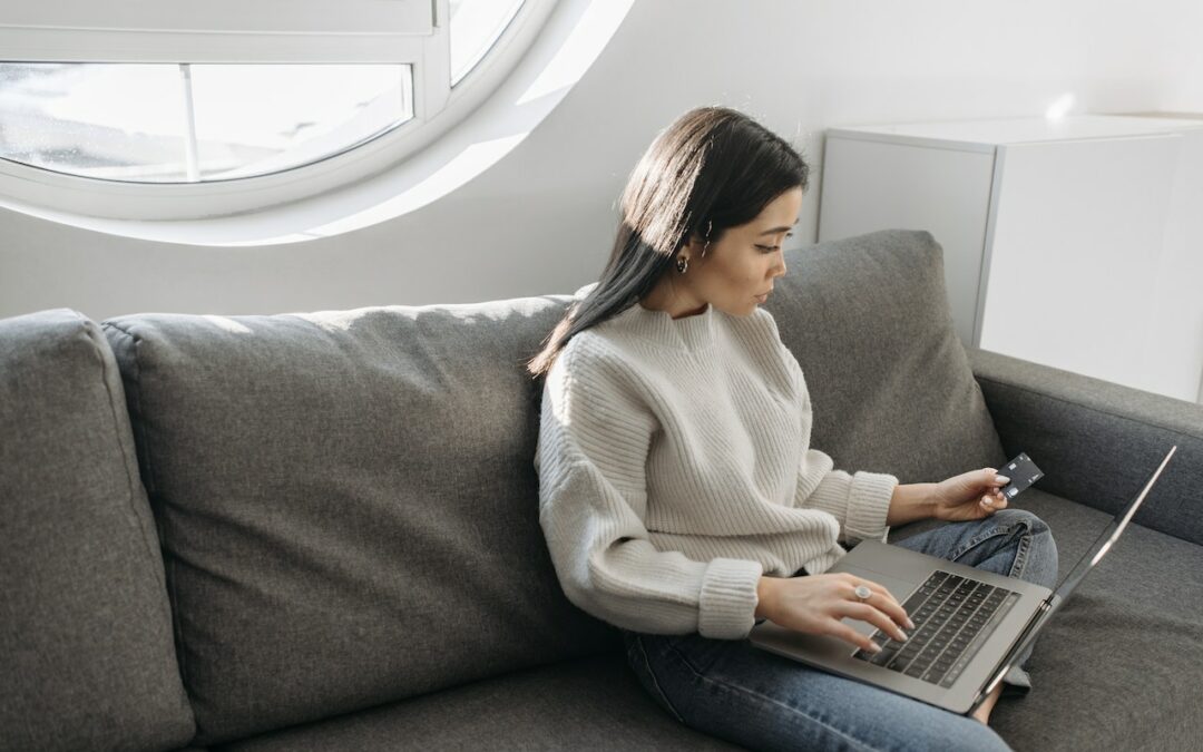 photo of woman working on her laptop